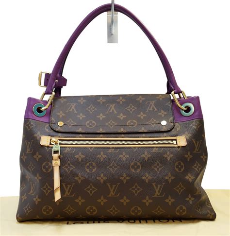 round dark purple bag louis vuitton|louis vuitton puffy bag.